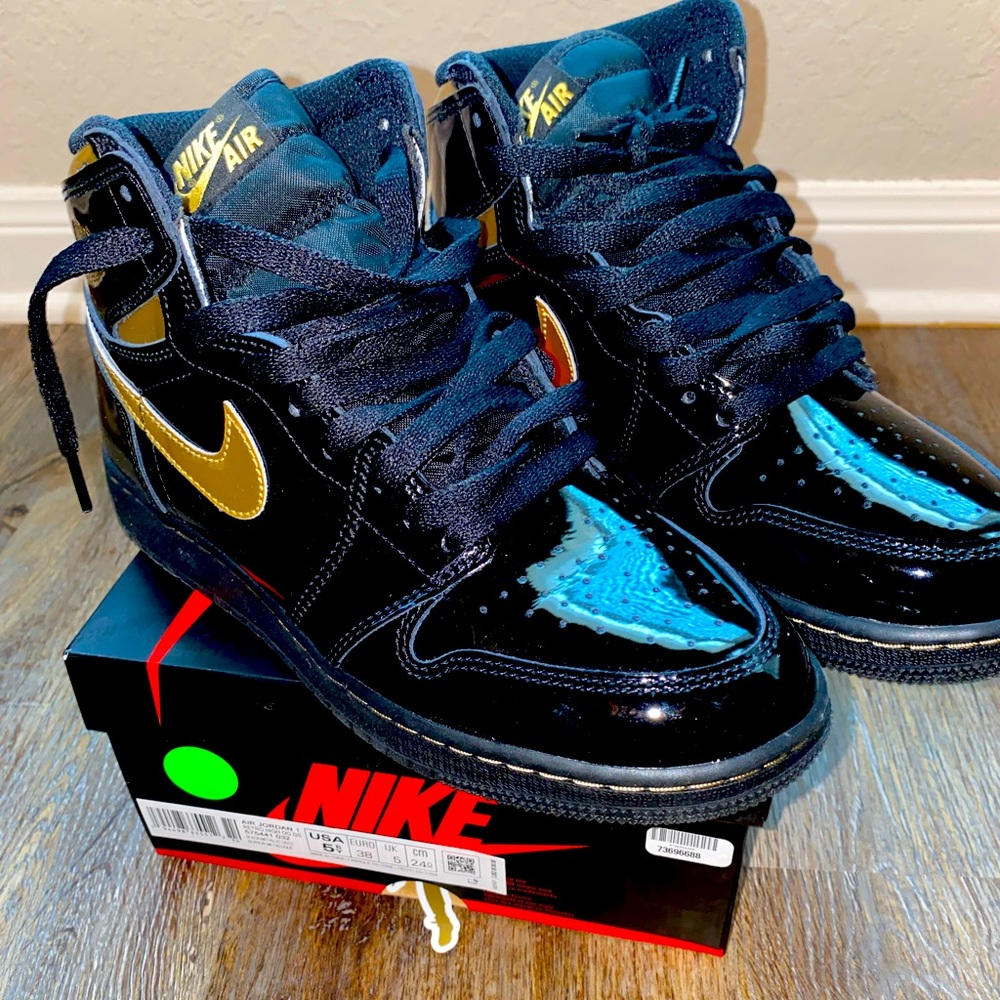 Black and Metallic Gold Air Jordan Retro 1s